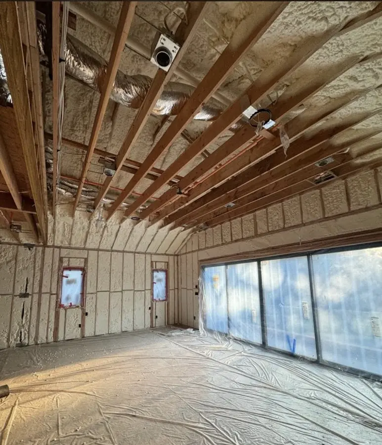 Interior walls and ceiling insulated with spray foam during new construction in Payette